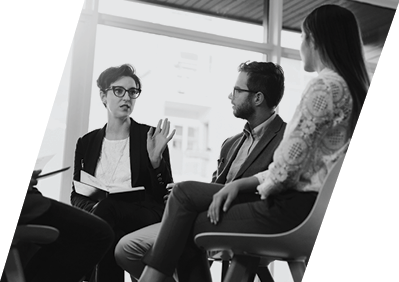 Three people sitting in chairs.

Description generated by AI